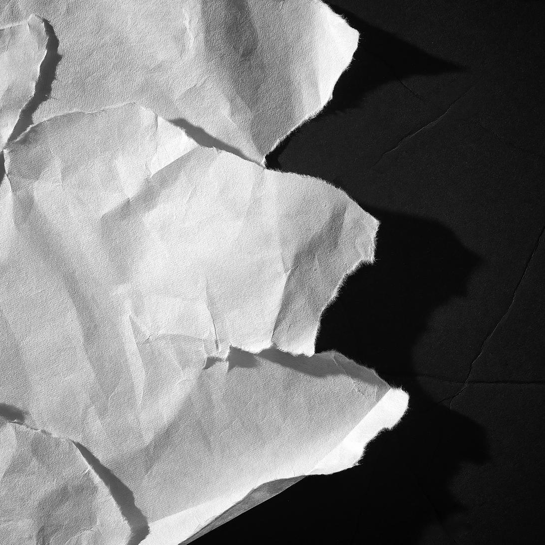 Torn and crumpled paper composition — Paper People visual identity